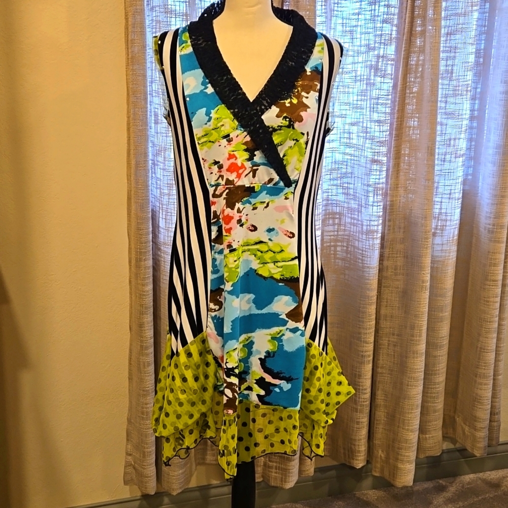 Chic multi color sleeveless handkerchief hem dress